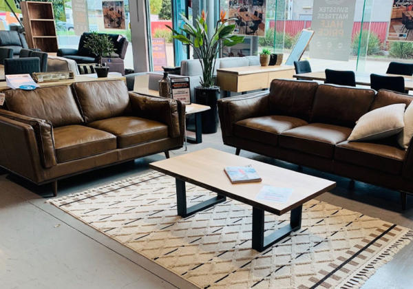Leather couches on display at the Thriftway Furniture Megastore